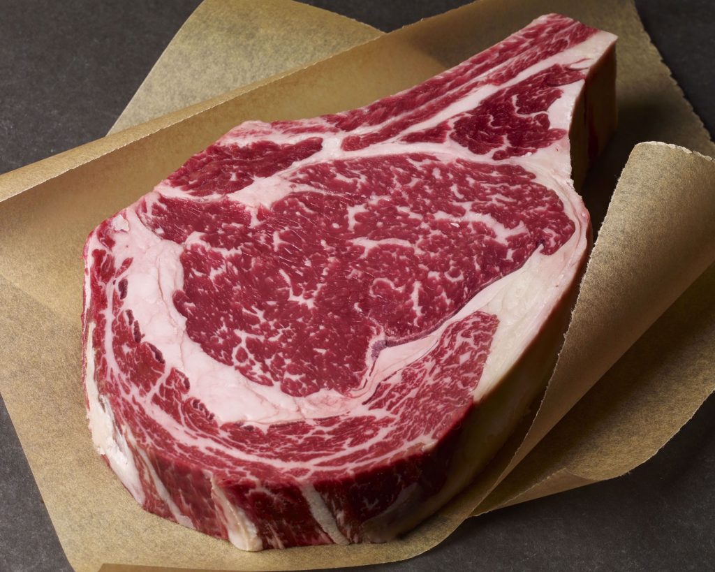 usda prime dry aged bone in rib steak