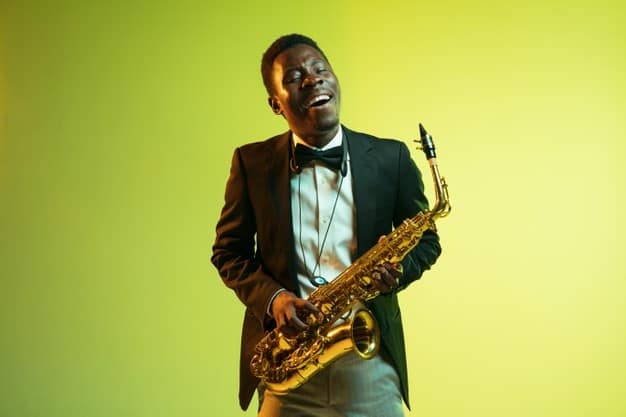 young african american jazz musician playing saxophone